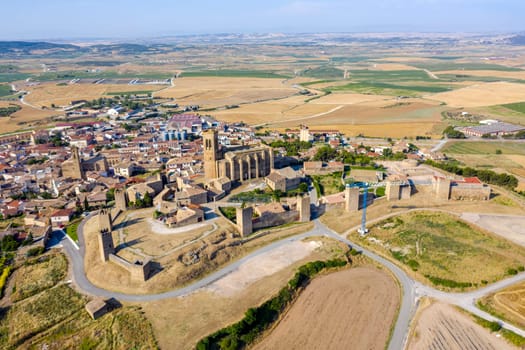 View of Artajona city with san Pedro church from fortress, Navarra Spain