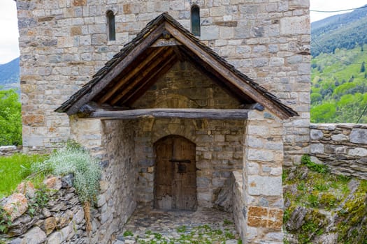 Church of Santa Maria of Cardet, Catalonia - Spain. It belongs to the municipality of Valle de Bohi, Detail of the entrance portal