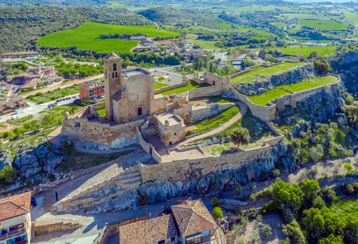 main facade and entrance with the wall in the foreground of the castle of Benabarre, Ribagorza Counts castle, Huesca Aragon spain