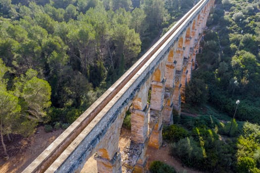view of the roman aqueduct Pont del Diable, Tarragona, Spain. Detail upper part of the water channel