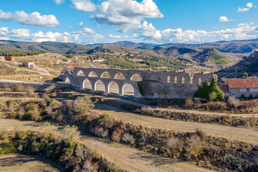 Morella aqueduct in Castellon Maestrazgo at Spain blue sky