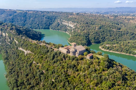 Aerial view of a Benedictine monastery of Sant Pere de Casserres on the Ter river.