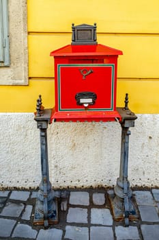 Mail box red. Budapest, Hungary. Red letterbox in Budapest.