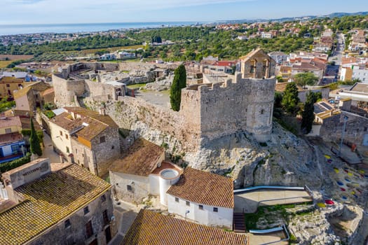 Medieval stone castle of Catalonia on the rock in Spain. Main landmark of Calafell town