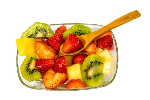fresh fruit macedonia cut into cubes,Isolated blank background with spoon. Top view
