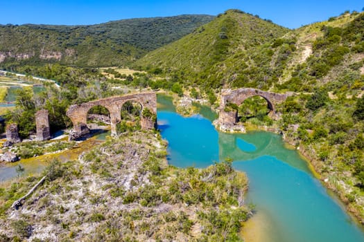 Medieval Roncal bridge of Yesa, which crosses the Aragon river Spain