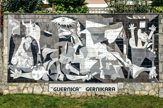 Guernica, Spain - April 09, 2018: A tiled wall in Gernika reminds of the bombing during the Spanish Civil War.Painting 1937 by Pablo Picasso