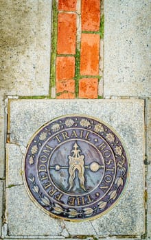 Boston, MA, September 28, 2020: Plaque marking the beginning of the Freedom trail at the Bunker Hill Monument
