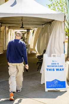 Lexington, Kentucky, April 9, 2021: Entrance to the University of Kentucky vaccination center at Kroger Field Stadium in Lexington, Kentucky