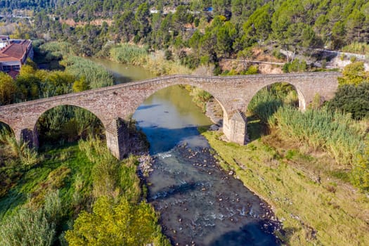 Castellbell and El Vilar old bridge over the Llobregat river. Northern sector of the town. Catalonia Spain