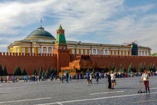Moscow, Russia - September 15, 2018: Tourists behind Lenin's mausoleum on on Red Square in Kremlin located