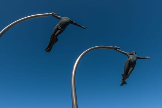 Monument to the Wind statue on the waterfront in Puerto Natales, Chile