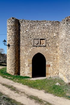 Gate of the mountain in the medieval wall of Palazuelos, Siguenza Guadalajara, Spain