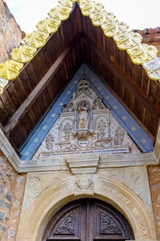 Church of Rennes le Chateau, France. Detail of the entrance porch