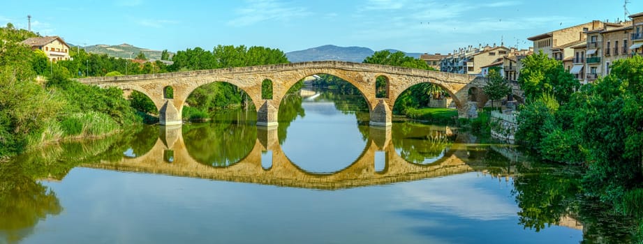 Ancient roman bridge across the Arga river in Puente la Reina near Pamplona Navarra Spain