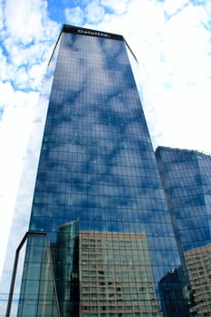 High glass skyscraper in Warsaw. Modern architecture of city buildings. Business center with modern buildings in Warsaw. Skyscrapers in city