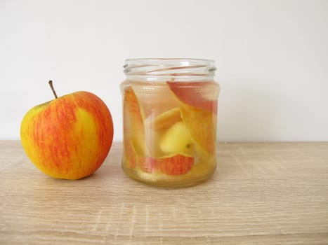 Preperation of homemade apple cider vinegar in a jar