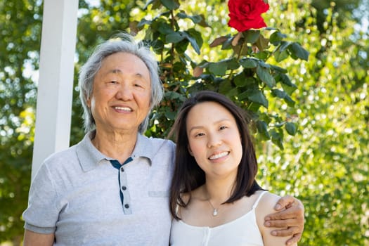 Chinese Father and Daughter Outdoors.
