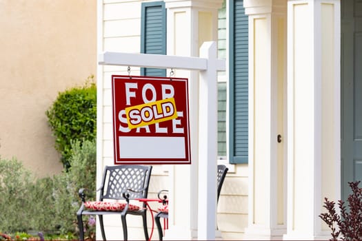 Sold Home For Sale Real Estate Sign in Front of New House.