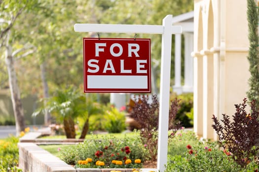 Home For Sale Real Estate Sign in Front of New House.