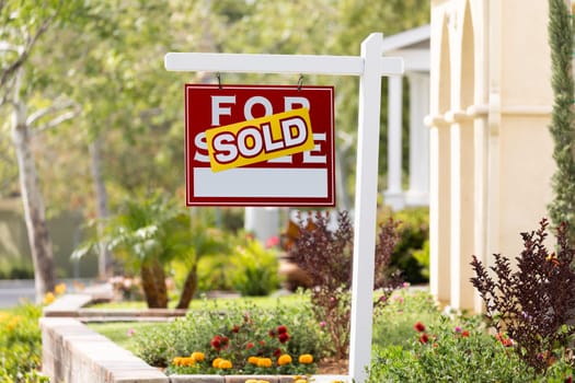 Sold Home For Sale Real Estate Sign in Front of New House.