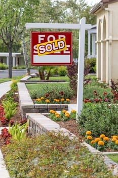 Sold Home For Sale Real Estate Sign in Front of New House.