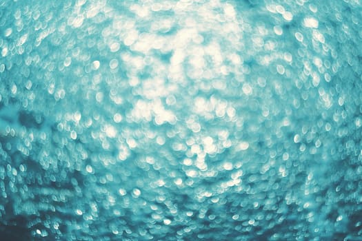 Bokeh lights.Lights on sea background.Waves.Underwater.Vintage style.