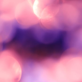 Abstract background with bokeh defocused lights and shadow.Multicolors bokeh.Vintage style.Disco lights.