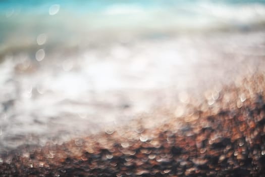 Water bokeh lights on the coastline.Natural background.