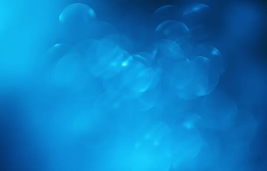 Lights on blue background.Underwater.