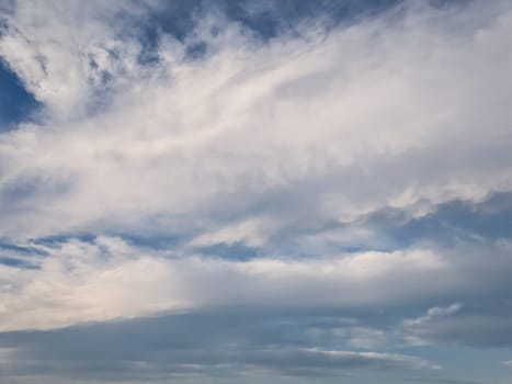 Tranquil cloudscape scene over the blue sky. Fluffy white clouds aerial composition. Misty overcast cumulus shapes, abstract nebula textures. Air fresheners, celestial beauty