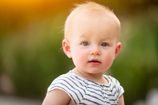 Adorable Infant Girl Child Portrait Outdoors.