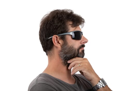 portrait of ordinary forty - 40 years old bearded man with sunglasses isolated on white