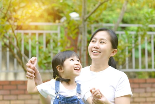 Mother and daughter in park. Mother Day.