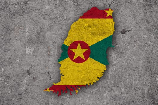 Map and flag of Grenada on weathered concrete