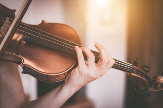 Young girl practices on her violin, acoustic music