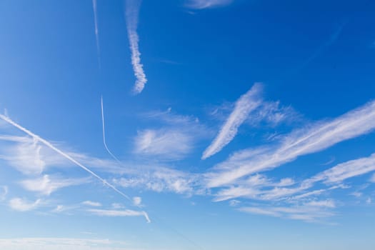 White clouds and stripes in the blue sky