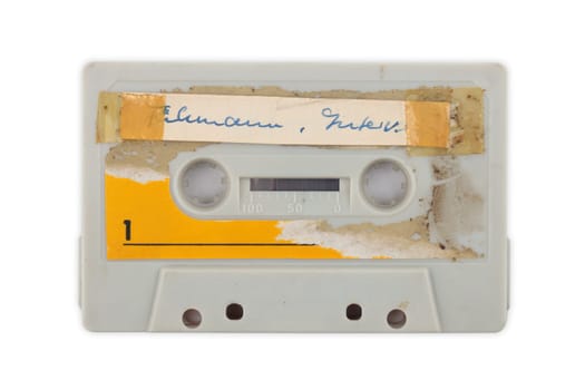 Labeled used audio tape isolated over white Background