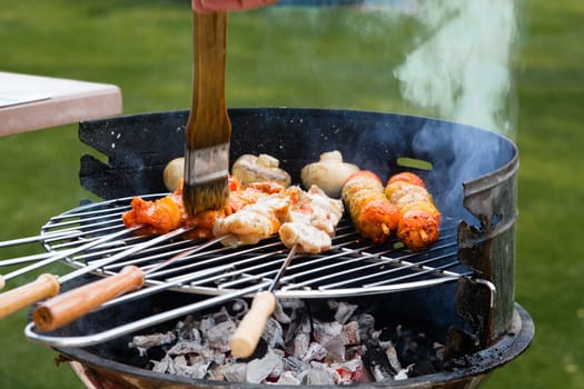 Grilled meat on a summer barbecue in the garden