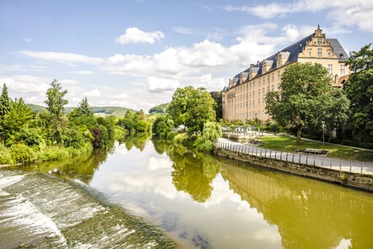 View from old Bridge to the River Werra in Hannoversch Muenden, Germany