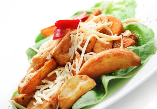 plate of decorative country potatoes with cheese