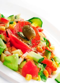 Decorative colorful salad with various vegetables