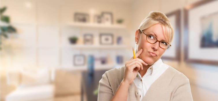 Beautiful Expressive Student or Businesswoman with Pencil in Office.