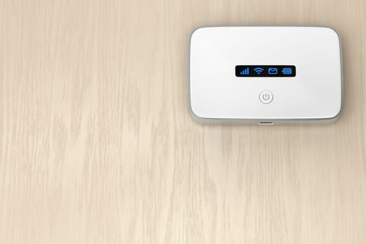 Mobile wifi router on the wooden table