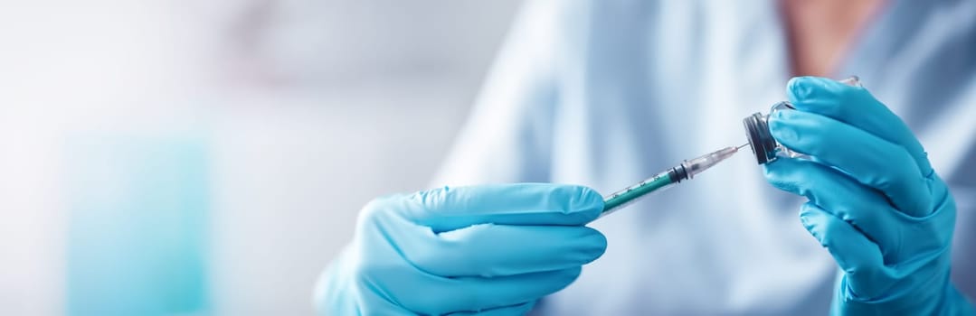 Nurse in surgical gloves holding an injection needle. Concept of vaccination against pandemic of Covid-19.