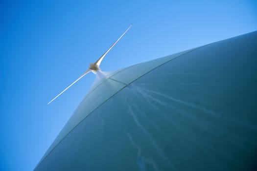 Wind turbine in the port of Magdeburg in Germany seen from below