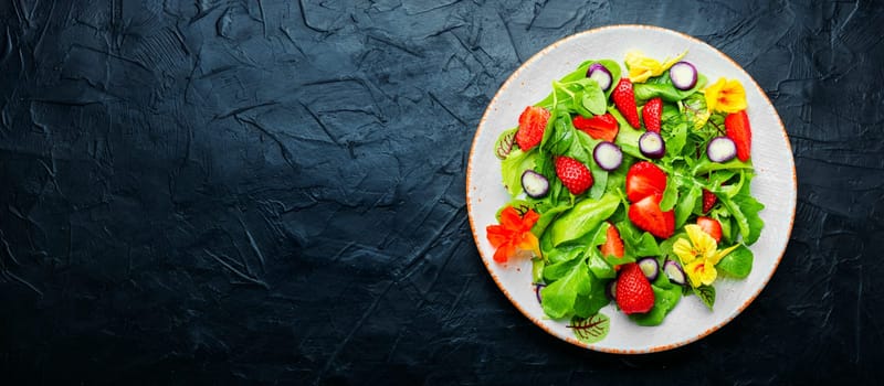Fresh vegan salad of green ripe strawberries.Summer vitamin salad.
