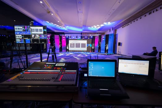 Live internet streaming of business conference meeting, presenter joining a seminar via video conference call in empty convention center. Online webinar or seminar via social network broadcast in new normal, covid outbreak,e-learning.