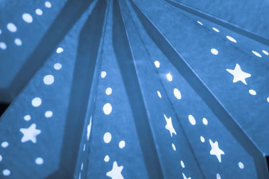 Shiny star mood lamp background is merry advent decoration. Traditional symbol of the best miracle time of the year. Part of series.