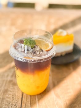 A glass of iced americano with orange juice, stock photo